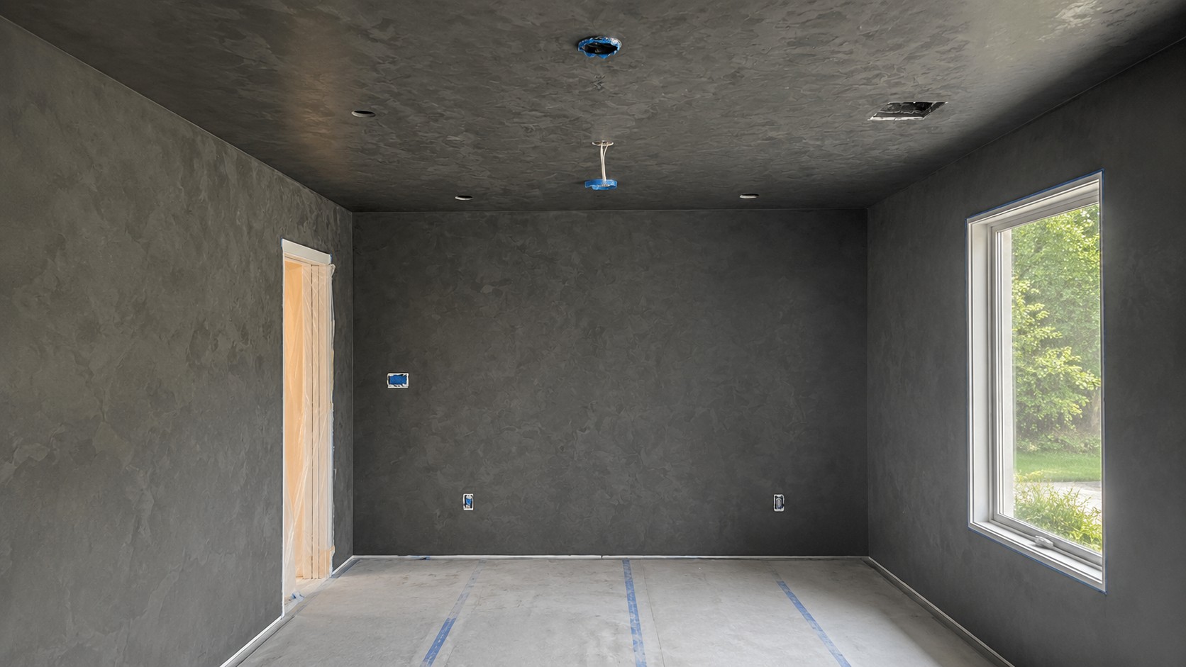University Park dining room walls mid-installation with raw plaster passes, before final burnish