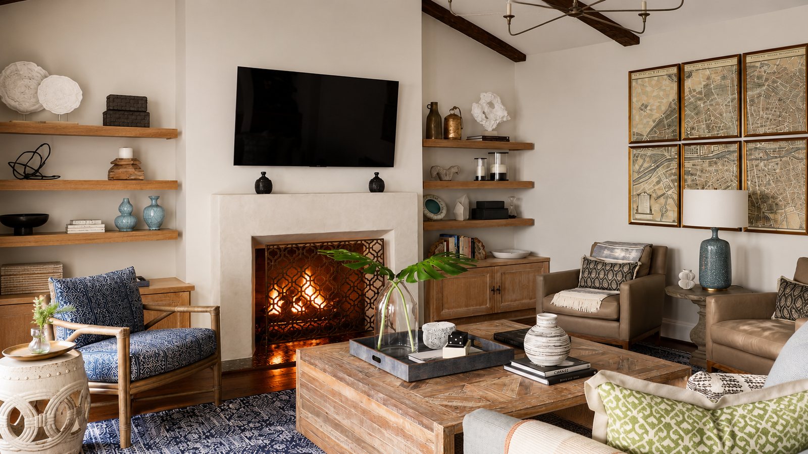 Living room with a Venetian plaster fireplace surround and built-in shelving.